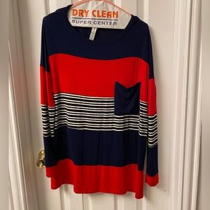 Cute long sleeve shirt. Red, white, navy, and black in color. Super soft.